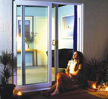 Why not make an existing window into a patio door.
