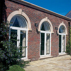Complete arched frames with bespoke leaded glass.
