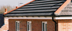 Contrasting bright white & black guttering/downspouts.